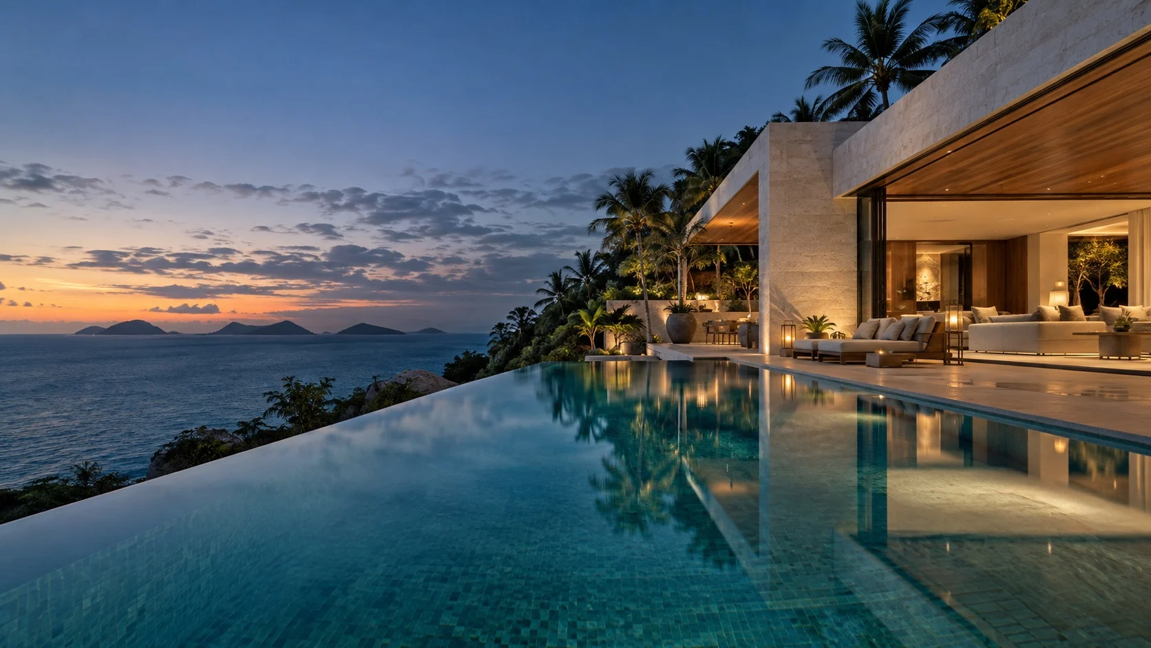 Luxury coastal villa with an infinity pool at dusk